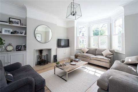 18 Dunmore Road, London, SW20 8TN
