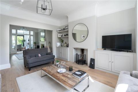 18 Dunmore Road, London, SW20 8TN