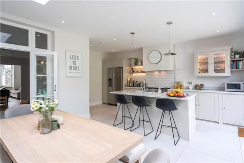 18 Dunmore Road, London, SW20 8TN