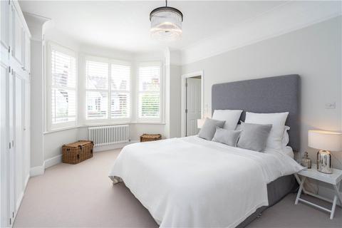 18 Dunmore Road, London, SW20 8TN