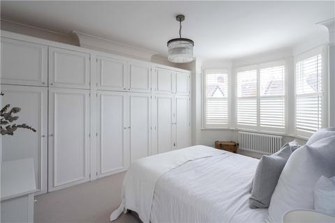 18 Dunmore Road, London, SW20 8TN