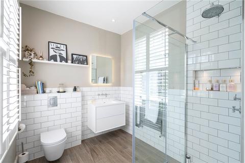 18 Dunmore Road, London, SW20 8TN