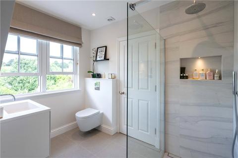 18 Dunmore Road, London, SW20 8TN