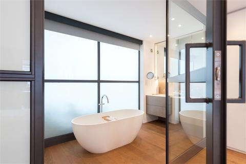 16 Russell Gardens Mews, London, W14 8EU