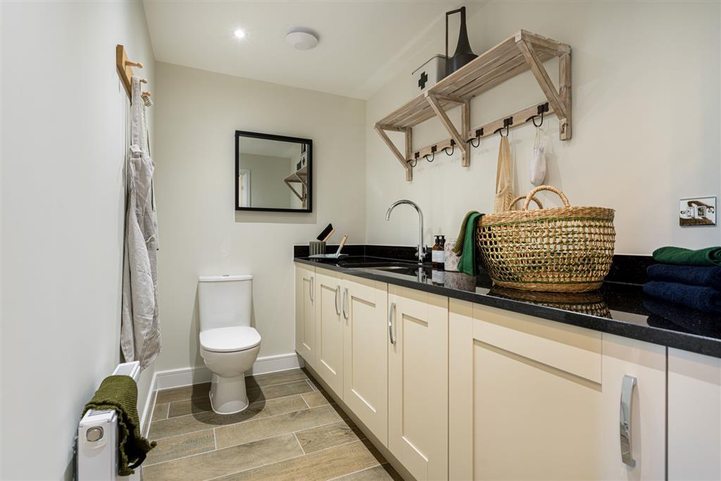 Combined downstairs toilet and laundry room