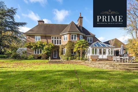 Merry Lodge Hazel Road, West Byfleet, KT14 6JJ