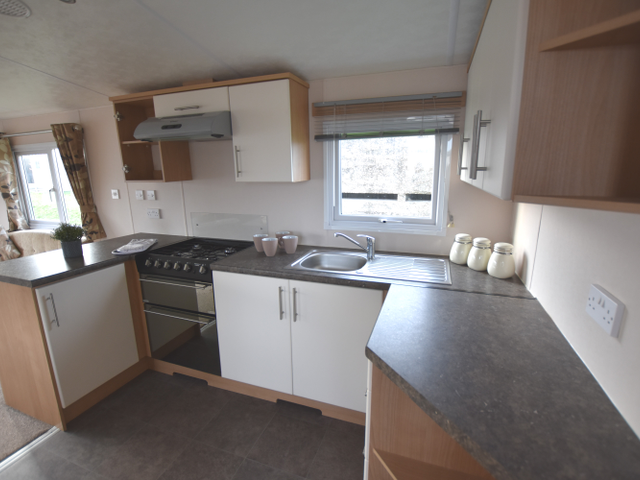 It also features a second bedroom - perfect for fa