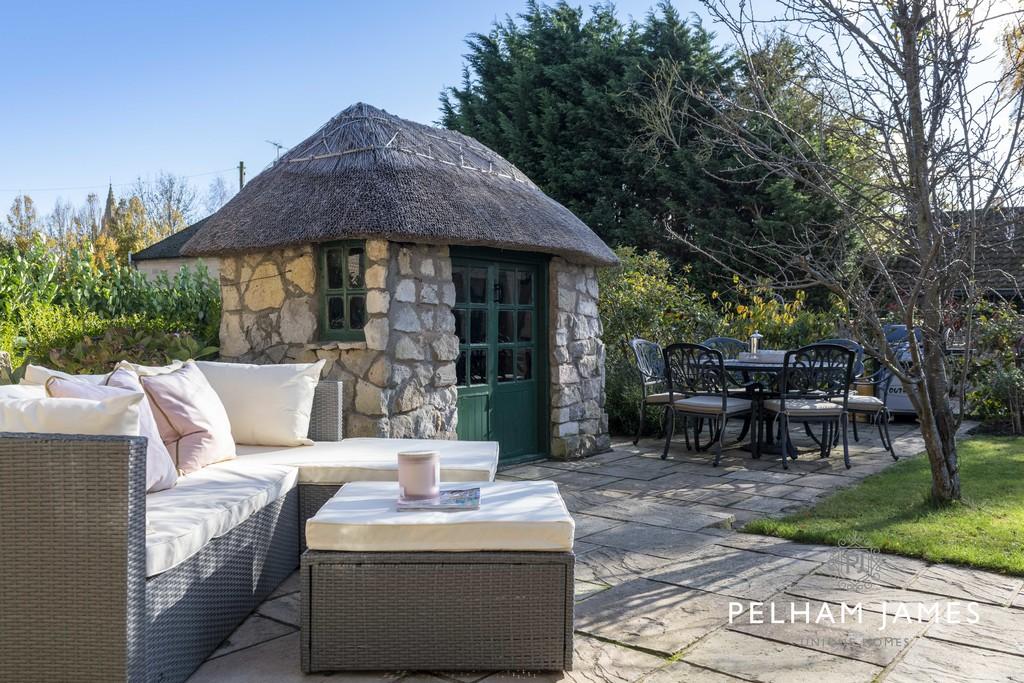 Terrace and Thatched Outbuilding