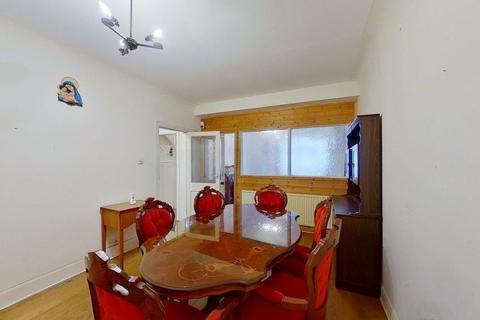 24 Lower Downs Road, London, SW20 8QG