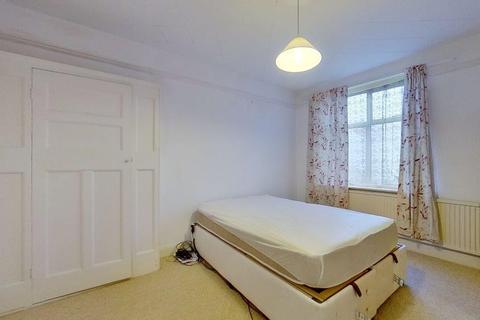 24 Lower Downs Road, London, SW20 8QG