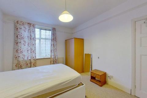 24 Lower Downs Road, London, SW20 8QG