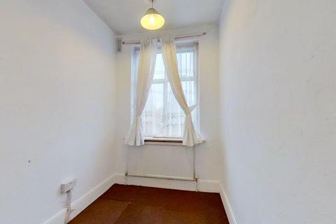 24 Lower Downs Road, London, SW20 8QG