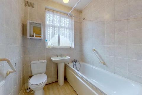 24 Lower Downs Road, London, SW20 8QG