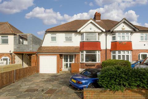 116 Walsingham Gardens, Epsom, KT19 0ND