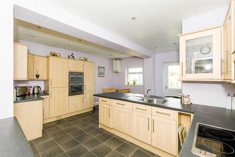 116 Walsingham Gardens, Epsom, KT19 0ND