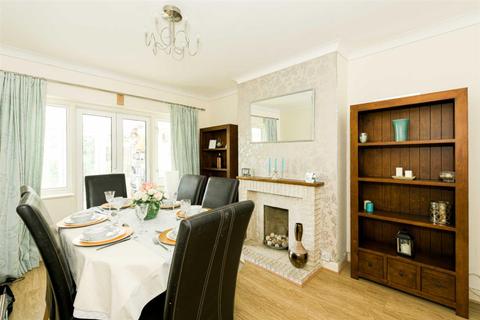 116 Walsingham Gardens, Epsom, KT19 0ND