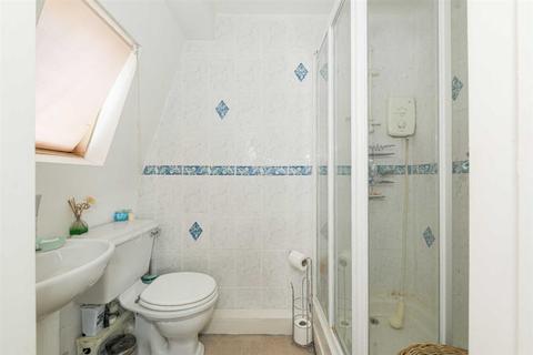 116 Walsingham Gardens, Epsom, KT19 0ND