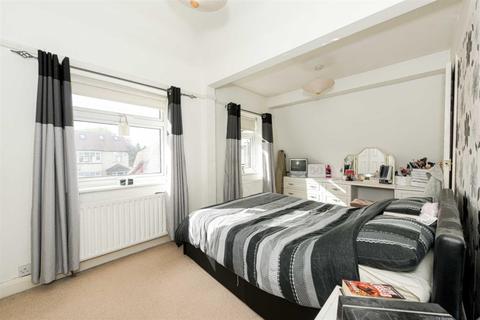 116 Walsingham Gardens, Epsom, KT19 0ND