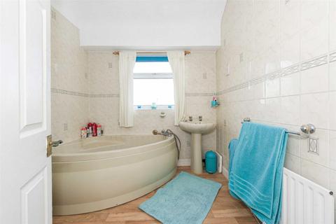 116 Walsingham Gardens, Epsom, KT19 0ND