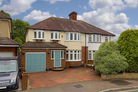 60 Walsingham Gardens, Epsom, KT19 0LX