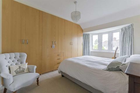 60 Walsingham Gardens, Epsom, KT19 0LX