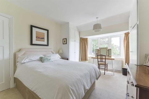 60 Walsingham Gardens, Epsom, KT19 0LX