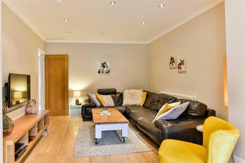 9 Ravensfield Gardens, Epsom, KT19 0ST