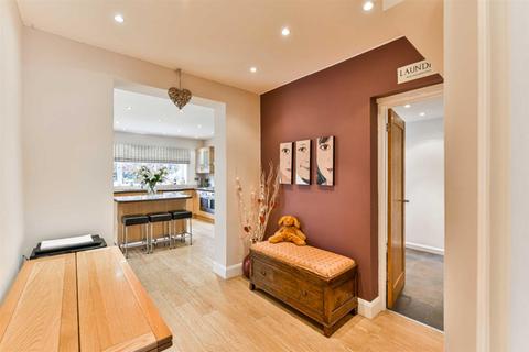 9 Ravensfield Gardens, Epsom, KT19 0ST