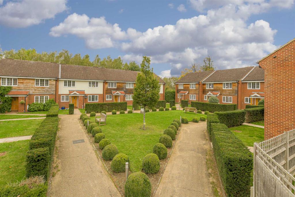 Cuddington Glade, Epsom 4 bed end of terrace house £700,000