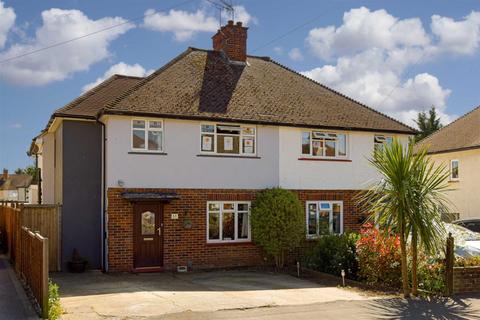 61 The Crescent, Epsom, KT18 7LJ