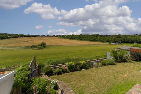 10 Langley Close, Epsom, KT18 6HG