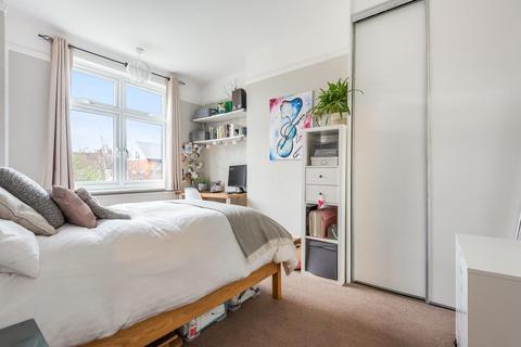 33 Abbott Avenue, London, SW20 8SG