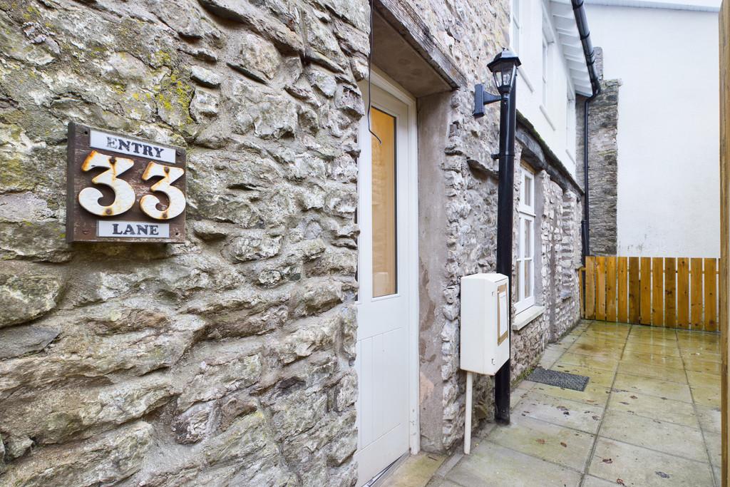 The cottage and courtyard