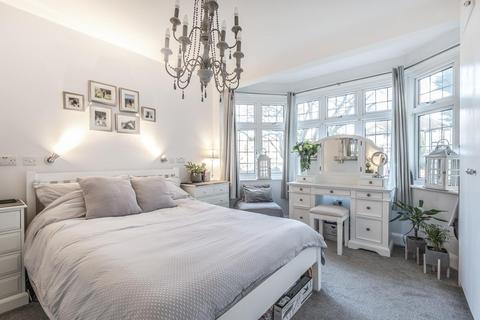 4 Huntley Way, London, SW20 0AH