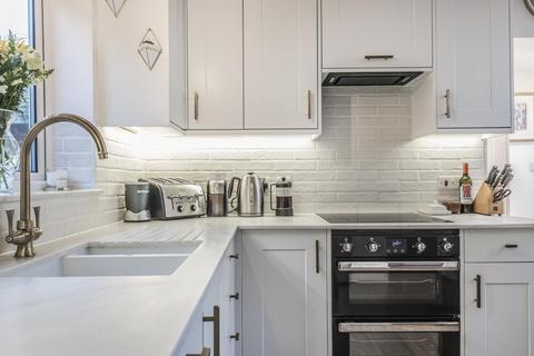4 Huntley Way, London, SW20 0AH