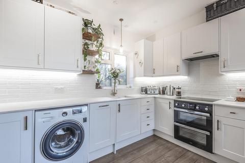 4 Huntley Way, London, SW20 0AH