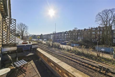 27 Russell Gardens Mews, London, W14 8EU