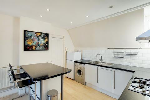 12b Griffiths Road, London, SW19 1SP