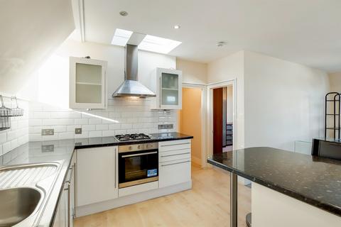 12b Griffiths Road, London, SW19 1SP