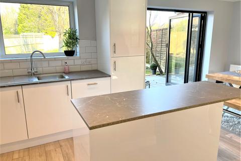 11 Cray Avenue, Ashtead, KT21 1QX