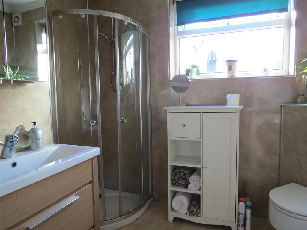 Shower Room/Utility: