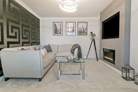 27 Rothbury Drive, Ashington, NE63 8TJ